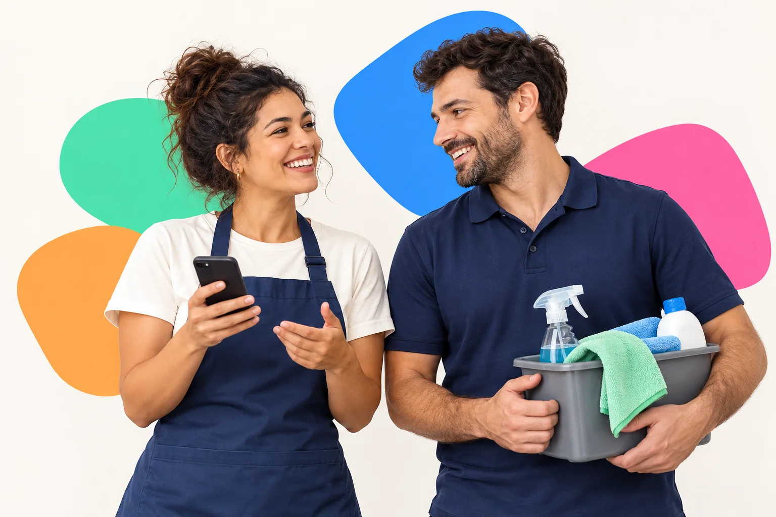 Two cleaning professionals planning their work together